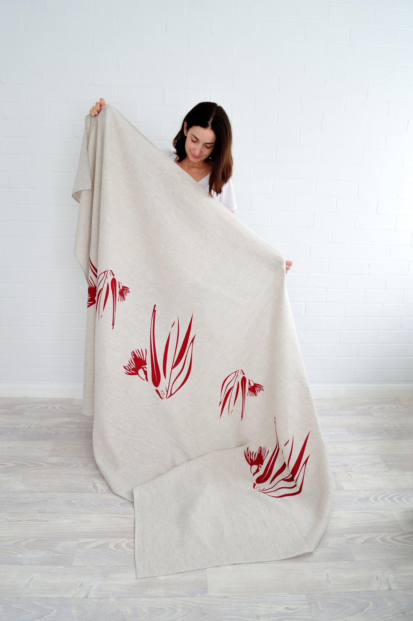 100% linen hand screen printed red gum nut tablecloth by Krystol Brailey Designs