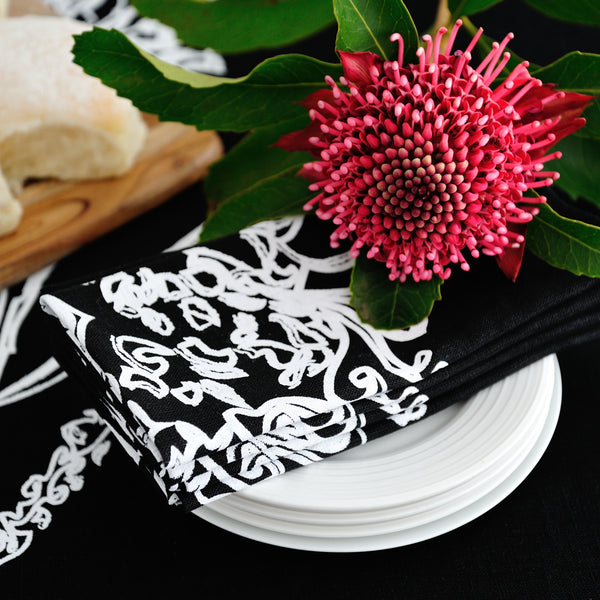 100% linen hand screen printed white gum nut on black napkins by Krystol Brailey Designs