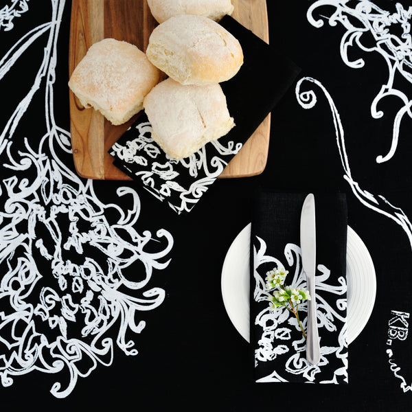 100% linen hand screen printed white waratah on black tablecloth by Krystol Brailey Designs