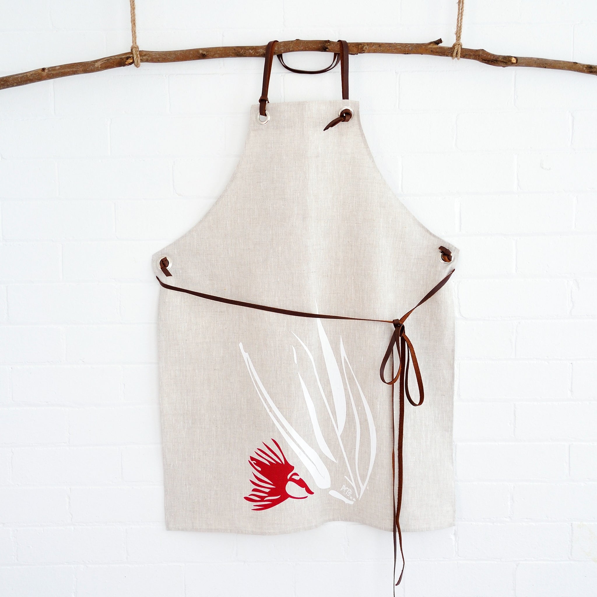 100% linen hand screen printed red and white gum nut adults apron with leather straps by Krystol Brailey Designs